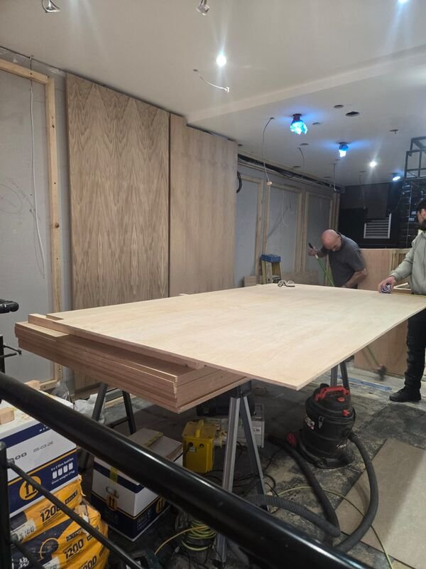 Bespoke joinery on site during an MP Design fit out